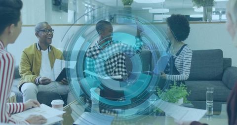 Professional Team Collaborating in Modern Office Lounge