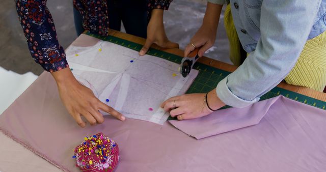 People Working on Sewing Pattern Design with Fabric and Cutting Tools - Download Free Stock Images Pikwizard.com