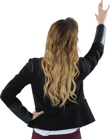Rear view of businesswoman touching transparent digital interface