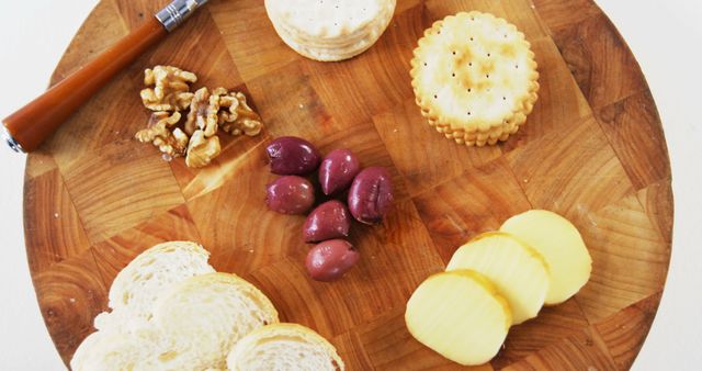 Rustic Cheese and Olive Appetizer Platter with Nuts and Crackers - Download Free Stock Images Pikwizard.com