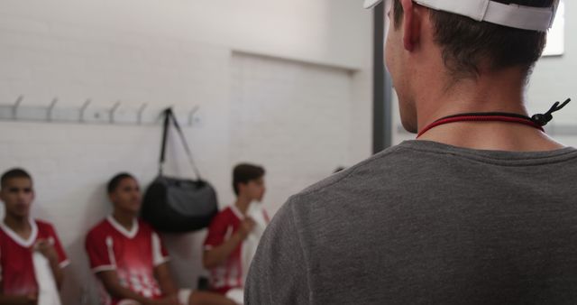 Coach Speaking To Young Soccer Players In Locker Room - Download Free Stock Images Pikwizard.com