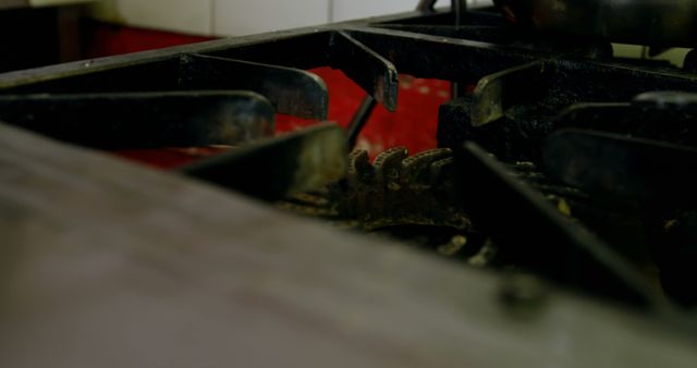 Detailed view of a dirty gas stove burner, showing accumulated grime and dirt. This can be useful for articles and blogs on household chores, cleaning tips, kitchen maintenance, and the importance of cleanliness in cooking areas.