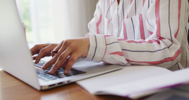 Person Typing on Laptop with Striped Shirt Close-Up - Download Free Stock Images Pikwizard.com