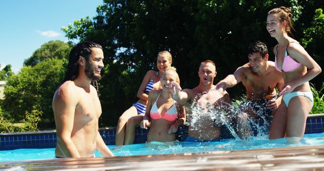 Group of Friends Enjoying Pool Party and Splashing Water - Download Free Stock Images Pikwizard.com