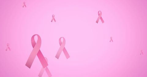 Pink Breast Cancer Awareness Ribbons on Light Pink Background