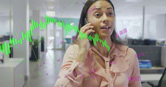 Businesswoman discussing market trends over phone in office - Download Free Stock Images Pikwizard.com