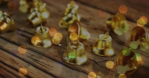 Golden Christmas Bells on Rustic Wooden Background - Download Free Stock Images Pikwizard.com