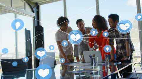 Diverse Team Collaborating on Digital Strategy in Modern Office