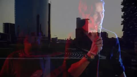 Rooftop Concert Overlooking Cityscape with Energetic Band Performance