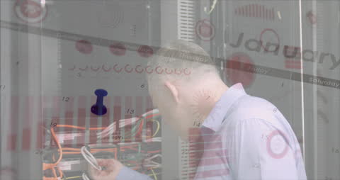 Man Analyzing Server Wires with Financial Graphs Overlapping