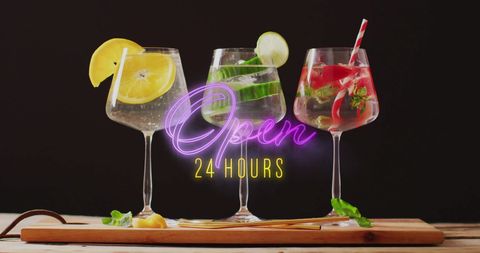 Neon open sign with refreshing cocktails background
