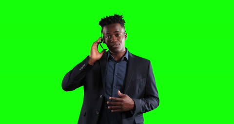 Confident Businessman in Suit Engaging on Phone Call