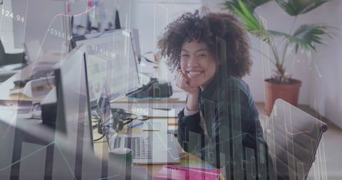 Smiling African American Businesswoman with Financial Data Overlay