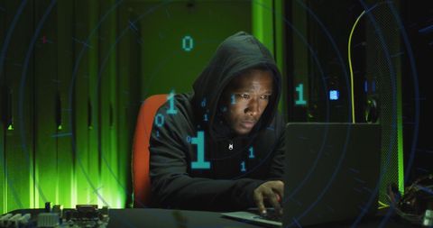 Cybersecurity Risk Awareness: Hacker Typing on Laptop in Dark Room - Download Free Stock Images Pikwizard.com