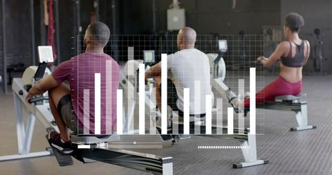 Diverse group exercising on rowing machines with digital data overlay