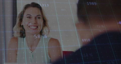 Professional Woman Analyzing Data in Modern Meeting Room