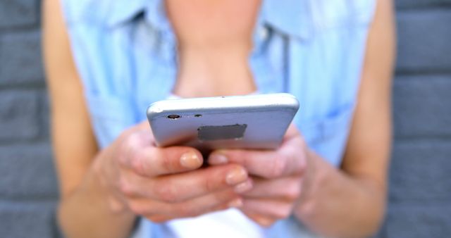 Woman Using Smartphone Outdoors in Casual Clothing - Download Free Stock Images Pikwizard.com