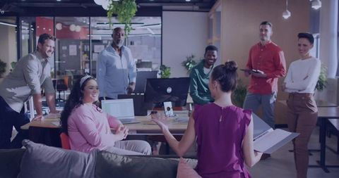 Diverse Team During Successful Office Meeting in Contemporary Workspace