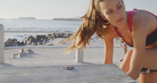 Woman Exercising at Beach Park with Ocean View - Download Free Stock Images Pikwizard.com