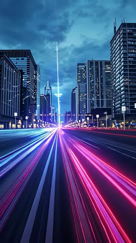 Vertical night hyperlapse with neon light trails racing down urban boulevard to glowing spire
