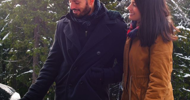 Young Couple Enjoying Winter Walk in Forest - Download Free Stock Images Pikwizard.com