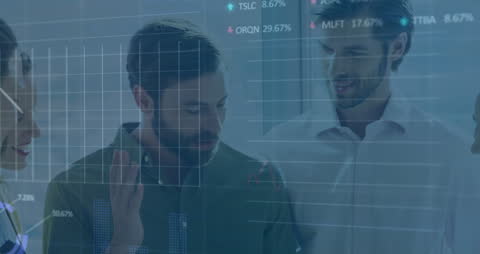 Diverse Colleagues Discussing Stock Market Data in Office