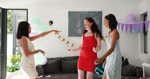 Joyful Diverse Friends Celebrating Birthday Indoors