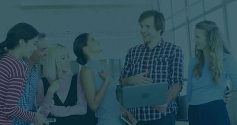 Coworkers Collaborating in Bright Modern Office Environment