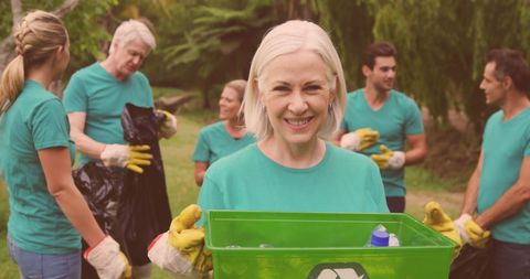 Diverse Volunteers Engaged in Eco-Friendly Cleanup - Download Free Stock Images Pikwizard.com