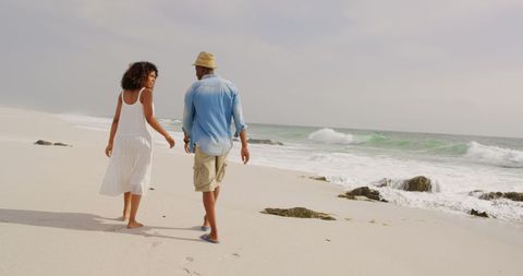Romantic Walk on Sandy Beach with Ocean Waves - Download Free Stock Images Pikwizard.com