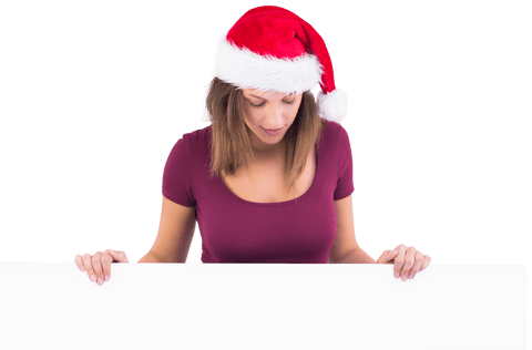festive woman in santa hat holding blank transparent sign - Download Free Stock Videos Pikwizard.com