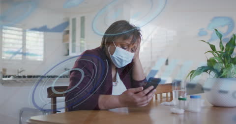 Woman with Face Mask Using Smartphone Amid Data Visualization