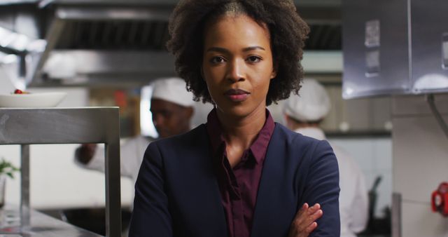 Confident African American Businesswoman in Restaurant Kitchen - Download Free Stock Images Pikwizard.com