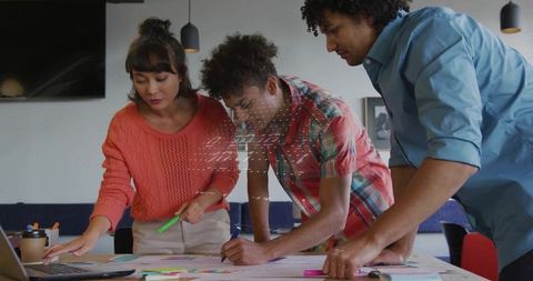 Creative Team Collaborating in Office on New Ideas