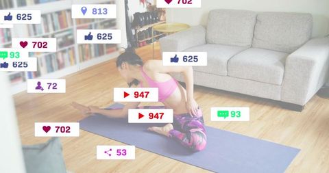 Home fitness influencer stretching on yoga mat with social likes views comments overlay