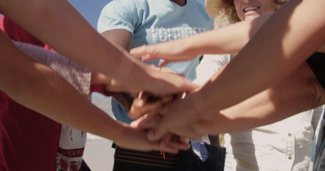 Unified Team Building at Beach with Hands Joined Together - Download Free Stock Images Pikwizard.com