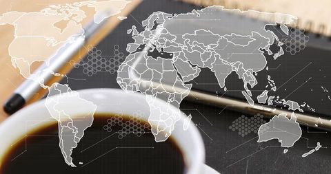 World Map Overlay on Laptop and Coffee Depicting Global Business Concept - Download Free Stock Images Pikwizard.com