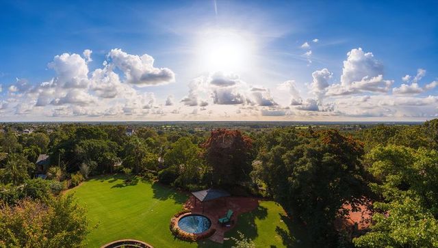 Glistening Spa Pool in Lush Backyard Garden Paradise