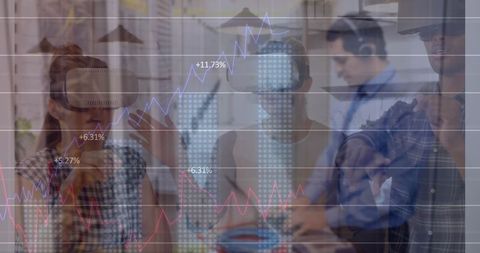 Innovative Team Analyzing Data with Virtual Reality in Modern Office