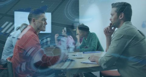 Innovative Business Meeting Amidst Digital Interface Overlay