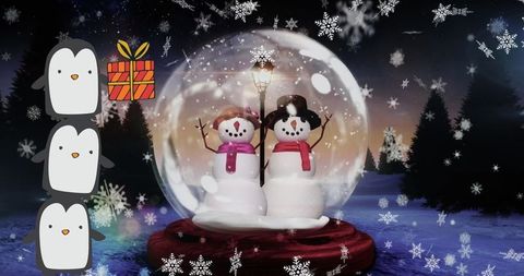 Charming Winter Scene with Snowmen Globe and Penguins - Download Free Stock Images Pikwizard.com