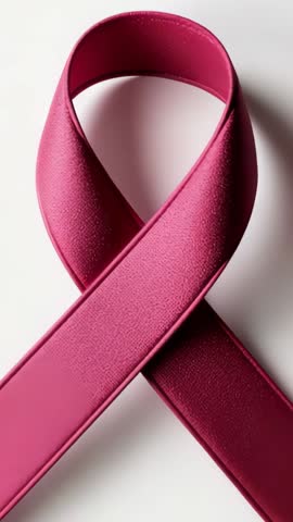 Rolling Pink Ribbon Loop Deepening Color and Raising Awareness Vertical Video