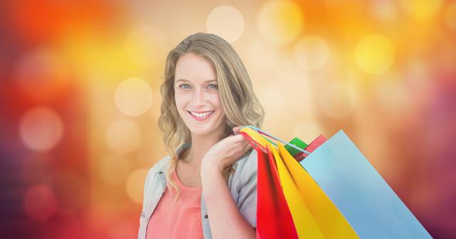 Young Woman Smiling with Shopping Bags against Colorful Bokeh Background - Download Free Stock Photos Pikwizard.com