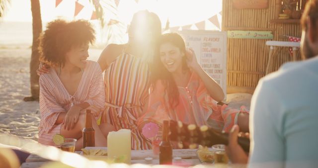 Friends Enjoying Sunset Beach Party with Live Music and Drinks - Download Free Stock Images Pikwizard.com