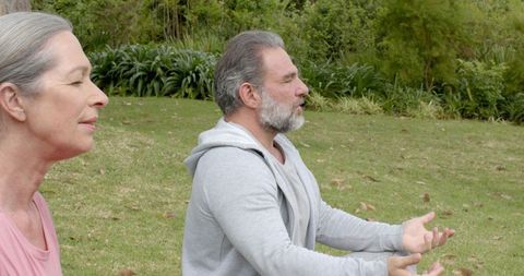Seniors Meditating Outdoors for Tranquility and Wellness