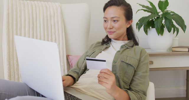 Woman Online Shopping Holding Credit Card near Laptop - Download Free Stock Images Pikwizard.com