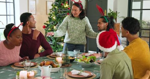 Diverse Family Enjoying Festive Holiday Dinner Together