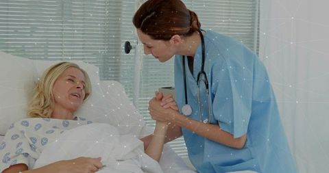 Nurse comforting patient in hospital ward showcasing care and empathy