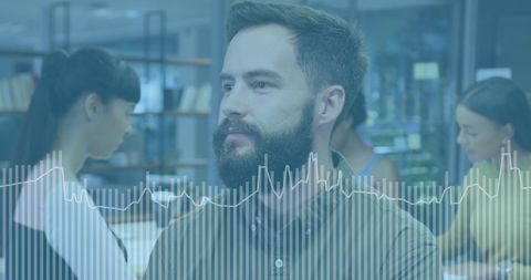 Diverse Team Analyzing Financial Data with High-Tech Interfaces