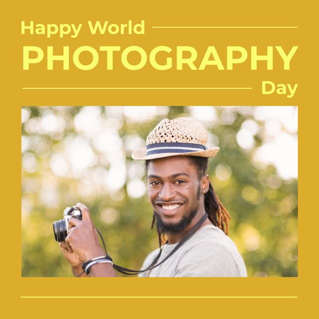 This image shows an African American man holding a camera and smiling in a park setting, celebrating World Photography Day. Ideal for use in social media posts and promotional materials related to photography events, hobbies, and outdoor activities. It conveys joy, passion for photography, and a love for nature.